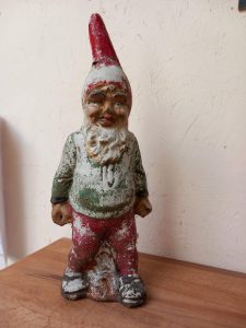 Vintage garden gnome probably dating from the 1940's. This one would have been pushing a wooden wheelbarrow. Height approx 33cm
Price £90