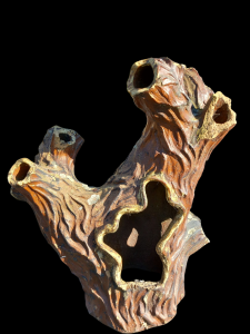 A Victorian salt-glazed tree stump "strawberry planter" in the popular Faux Bois style. Probably Scottish in origin. £380. A very rare chair in the same style is also available - please contact us for details.