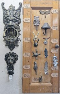 Cast Iron Door Knockers and Hooks.